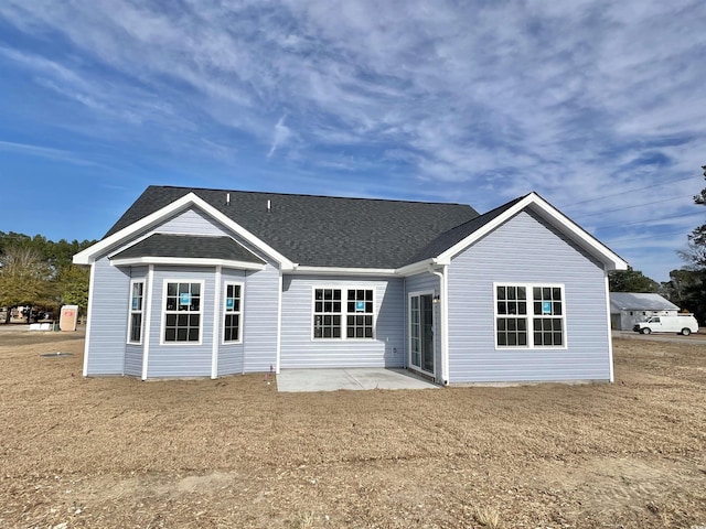 back of house with a patio area