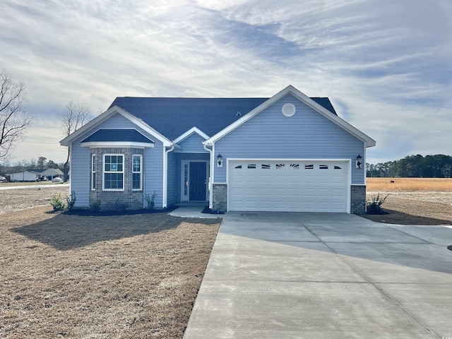 single story home with a garage