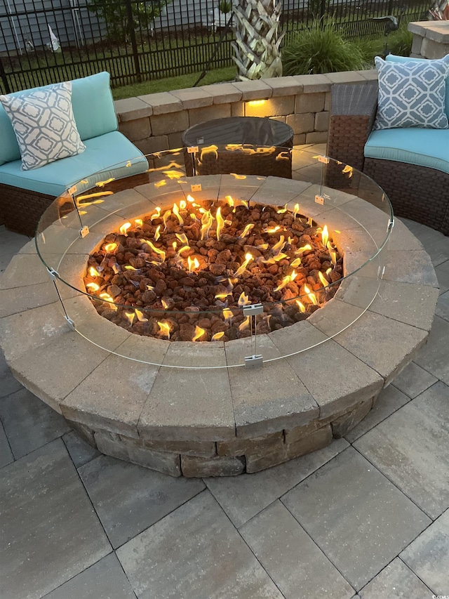 exterior details with a fire pit