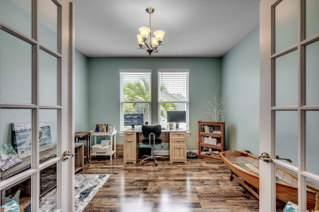 home office with french doors, wood-type flooring, and a notable chandelier