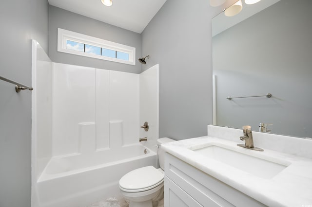 full bathroom featuring vanity,  shower combination, and toilet