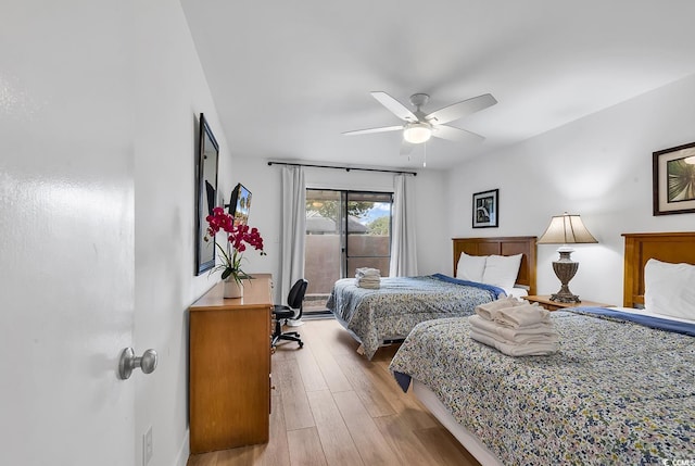 bedroom featuring access to exterior, ceiling fan, and light hardwood / wood-style floors