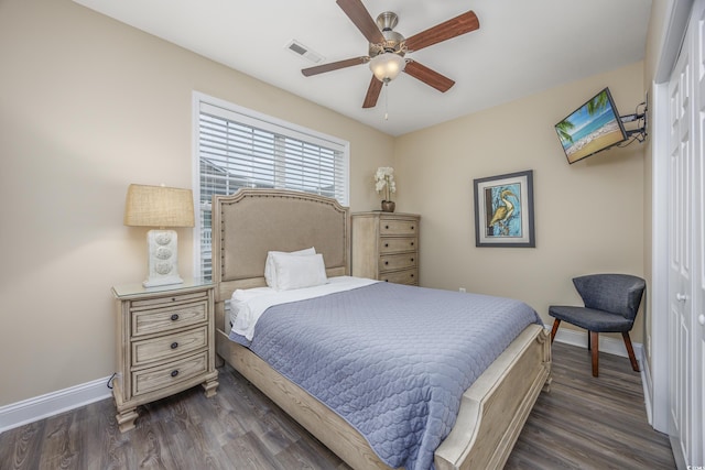 bedroom featuring dark wood-type flooring and ceiling fan