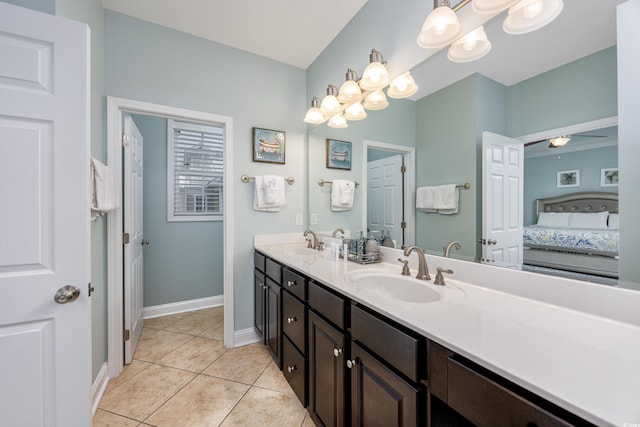 bathroom featuring vanity, tile patterned floors, and ceiling fan