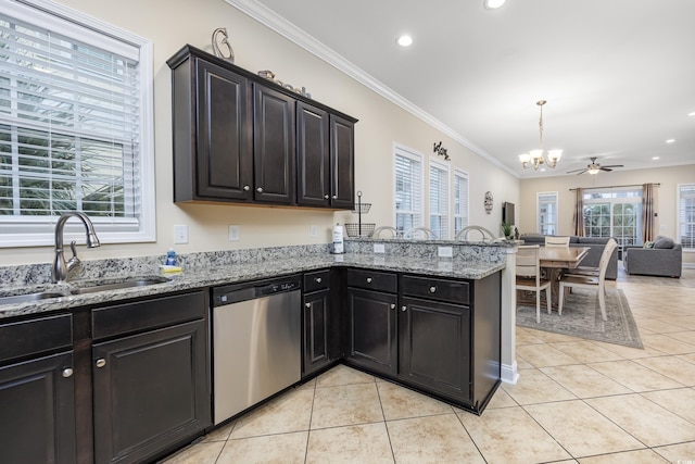 kitchen featuring light tile patterned flooring, crown molding, dishwasher, and sink