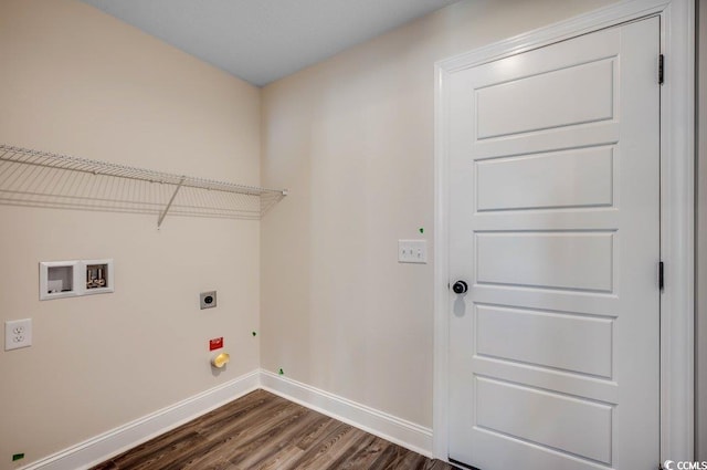 laundry area with electric dryer hookup, hookup for a washing machine, and dark hardwood / wood-style flooring