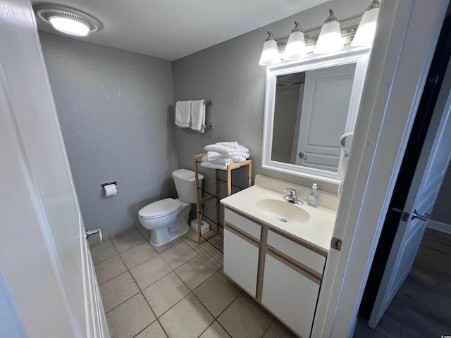 2701 S Ocean Blvd Unit 1808, North Myrtle Beach, SC 29582 - bathroom featuring vanity, tile patterned flooring, and a textured wall