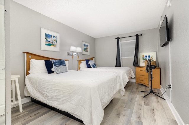 2701 S Ocean Blvd Unit 1808, North Myrtle Beach, SC 29582 - bedroom featuring light wood-style flooring