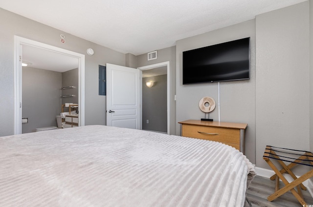 bedroom featuring light hardwood / wood-style flooring