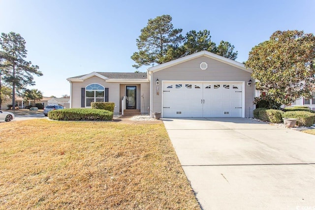 ranch-style home with a garage and a front lawn