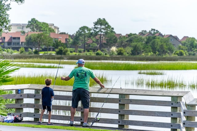 view of property's community featuring a water view