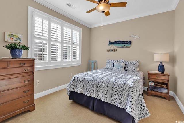 bedroom with light colored carpet, ceiling fan, and ornamental molding