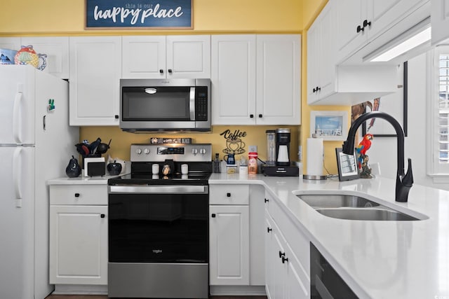 kitchen featuring white cabinetry, sink, and stainless steel appliances