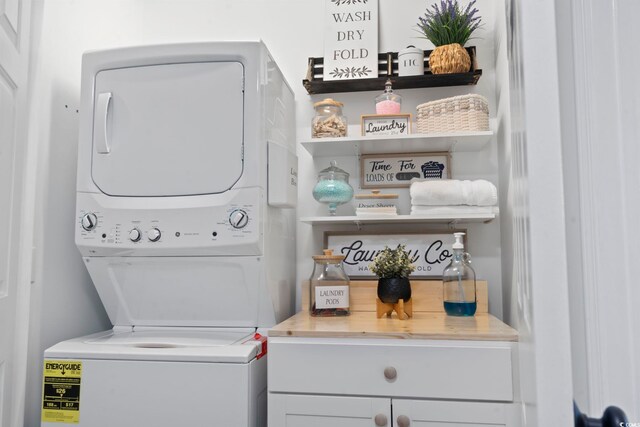 laundry room featuring stacked washing maching and dryer