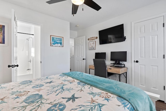 bedroom with connected bathroom, ceiling fan, and wood-type flooring