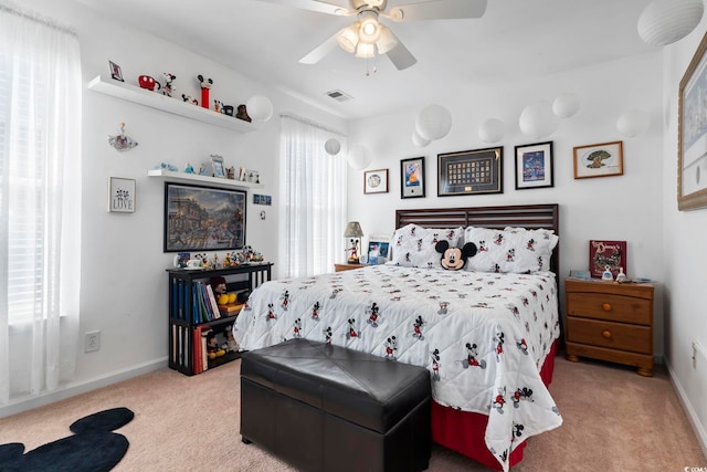 bedroom featuring ceiling fan and carpet floors