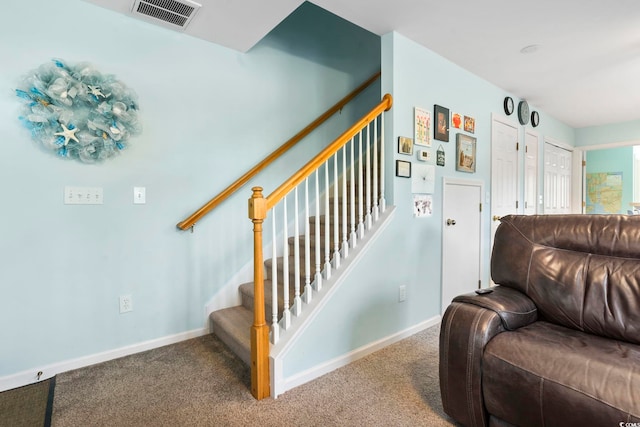 stairway with carpet floors