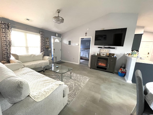 living room with vaulted ceiling