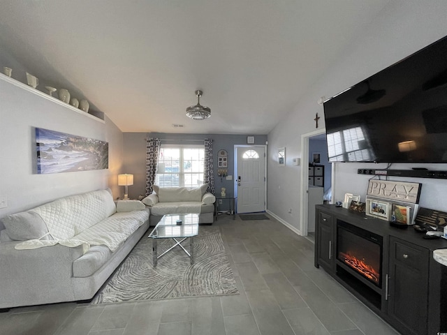 living room with vaulted ceiling