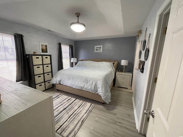 bedroom with light wood-type flooring