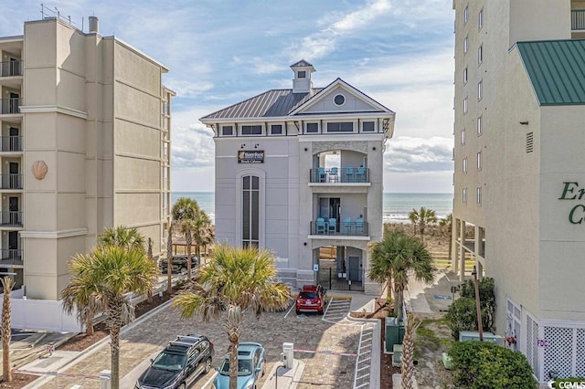 view of building exterior with a water view