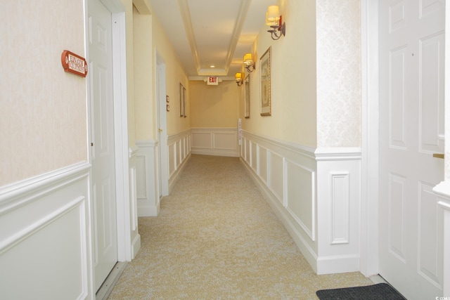 hallway featuring light carpet