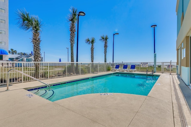 view of pool featuring a patio