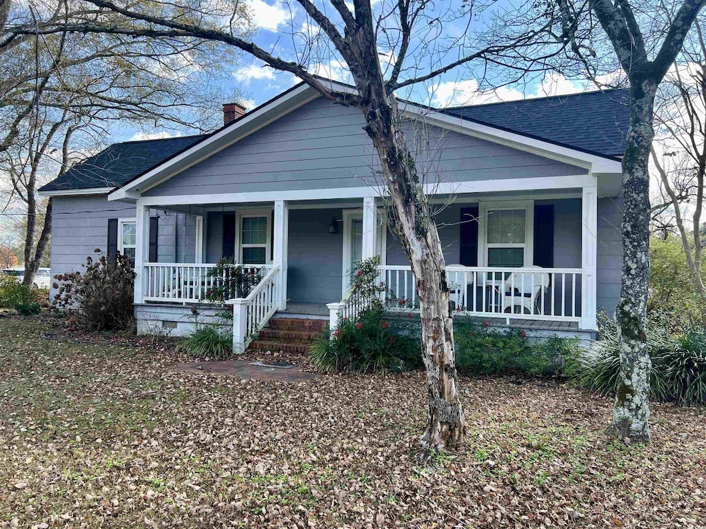 view of front of home featuring covered porch