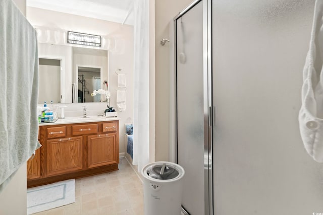 bathroom with vanity and walk in shower