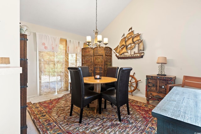 dining room featuring a chandelier and lofted ceiling