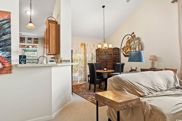 dining space featuring lofted ceiling, light carpet, and an inviting chandelier