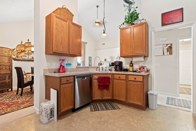 kitchen featuring dishwasher, sink, high vaulted ceiling, decorative light fixtures, and light tile patterned flooring