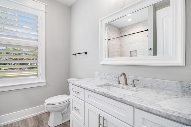 1201 Surf Pointe Dr, North Myrtle Beach, SC 29582 - full bathroom with wood finished floors, plenty of natural light, toilet, and vanity