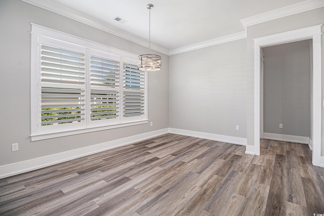1201 Surf Pointe Dr, North Myrtle Beach, SC 29582 - unfurnished dining area with ornamental molding, wood finished floors, a chandelier, and baseboards