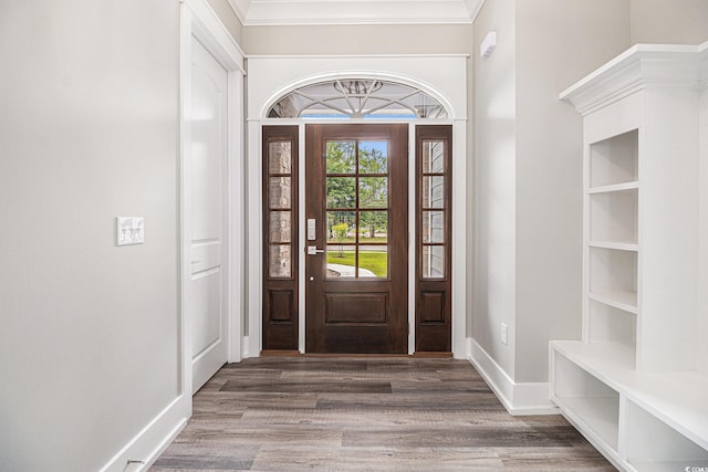 1201 Surf Pointe Dr, North Myrtle Beach, SC 29582 - foyer entrance featuring wood finished floors and crown molding