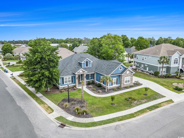 1201 Surf Pointe Dr, North Myrtle Beach, SC 29582 - view of front of property featuring a residential view, a front yard, and board and batten siding