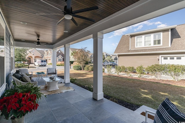 view of patio featuring ceiling fan