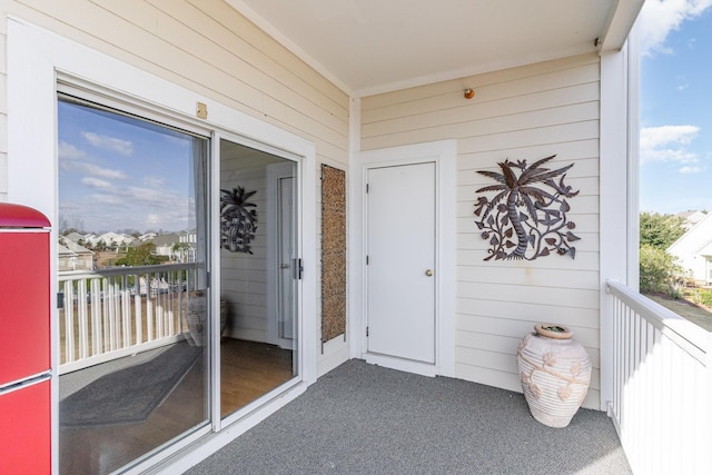 doorway to property with a balcony