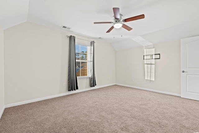 bonus room with ceiling fan, lofted ceiling, and carpet floors