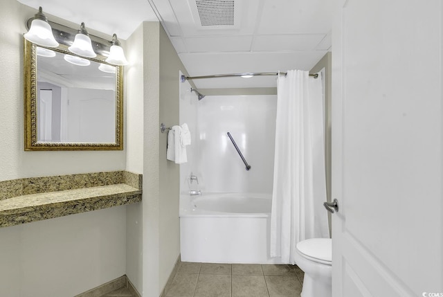 bathroom featuring shower / tub combo with curtain, toilet, visible vents, and tile patterned floors