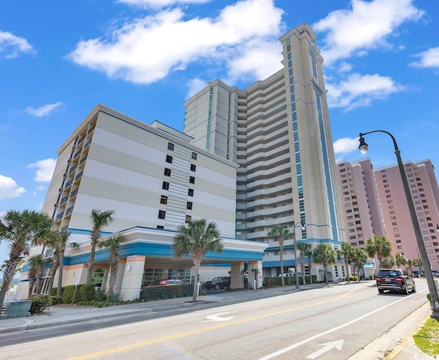 view of property with a city view