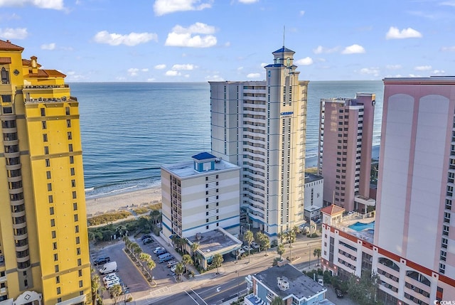 city view with a water view and a view of the beach