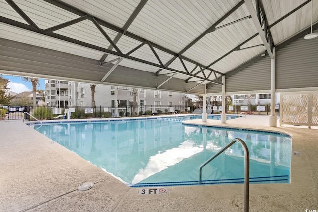 view of swimming pool with a patio