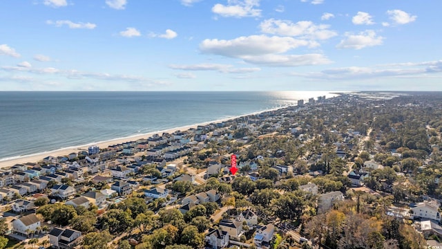 aerial view with a view of the beach and a water view