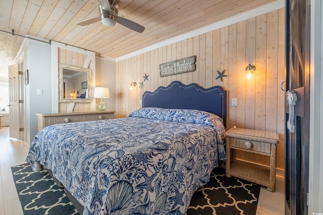 bedroom featuring ceiling fan, wood ceiling, and light wood-type flooring