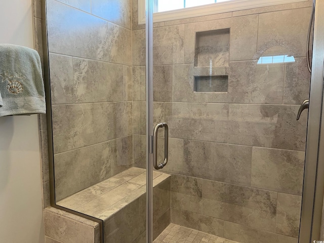 bathroom with a stall shower