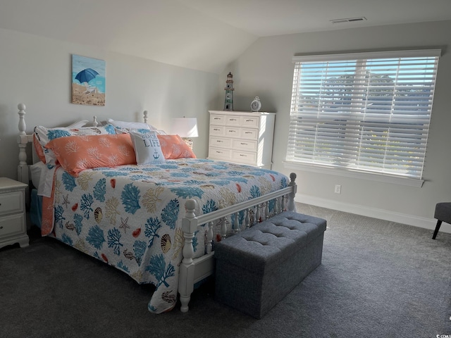 carpeted bedroom featuring visible vents, vaulted ceiling, and baseboards