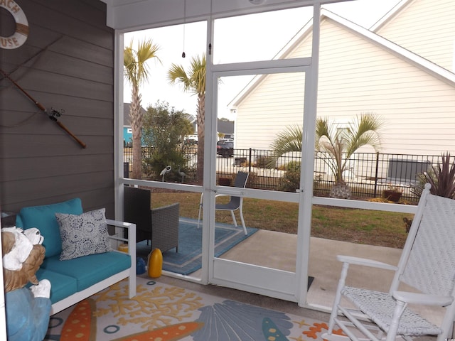 sunroom featuring a skylight