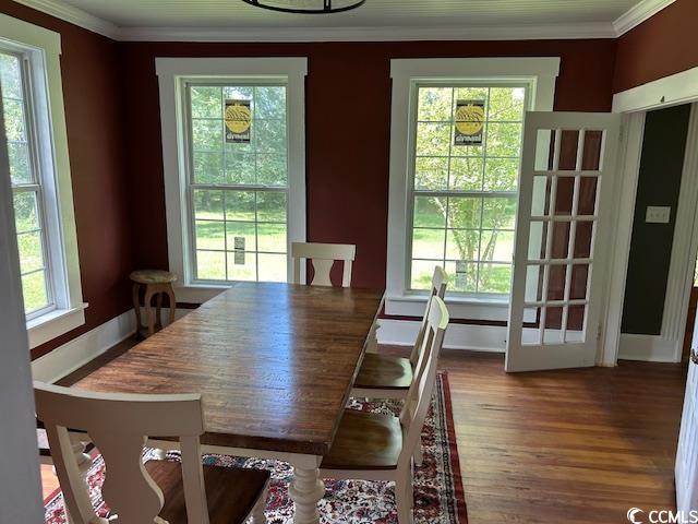 2708 Main St, Loris, SC 29569 - dining room with ornamental molding and wood finished floors