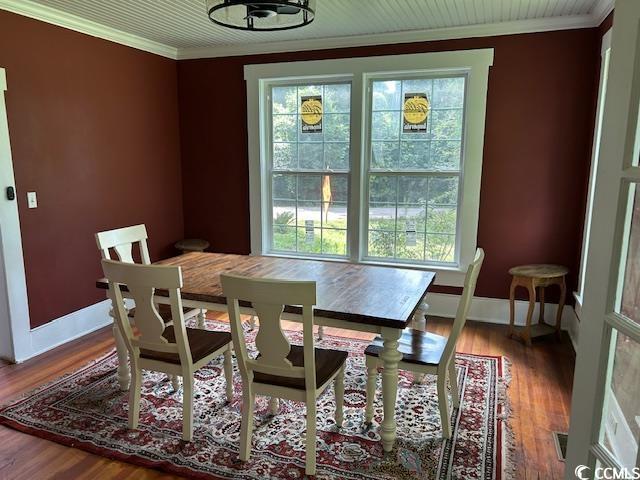 2708 Main St, Loris, SC 29569 - dining area featuring plenty of natural light, ornamental molding, and wood finished floors
